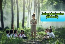A scene of active learning in the classroom with students asking questions to the teacher